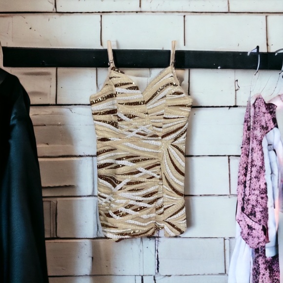 Luxxel Dresses & Skirts - Sequin Split Skirt/Romper faux dress by Luxell.  Size: Medium.